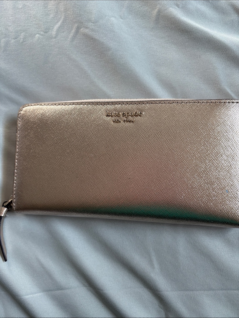 kate spade metallic rose gold zip-around wallet